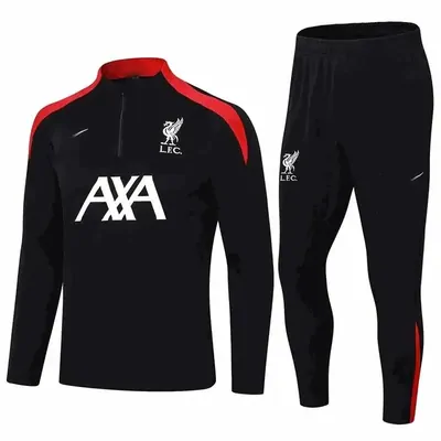 A black Liverpool training top with red shoulder stripes and AXA across the chest, shown with matching trousers